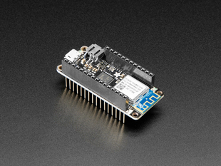 Angled shot of an Assembled Adafruit Feather M0 WiFi with Stacking Headers.