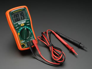 Angled shot of a Extech EX330 12-function autoranging multimeter - EX330. 