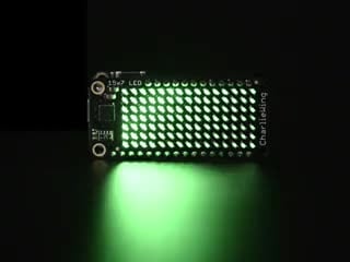 Video of a Adafruit 15x7 CharliePlex LED Matrix Display FeatherWing illuminating Green LEDs in a wave like pattern. 