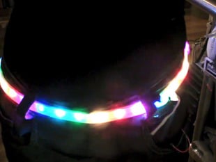 Waist of someone wearing a glowing LED belt