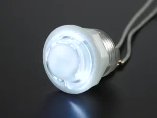 Video of 24mm mini translucent clear LED arcade button flashing on and off.