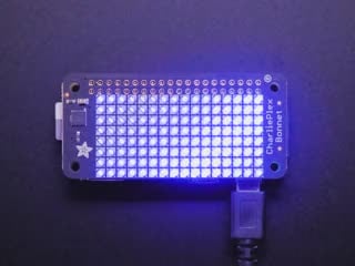 Video of a Adafruit CharliePlex LED Matrix Bonnet illuminating a blue light. 