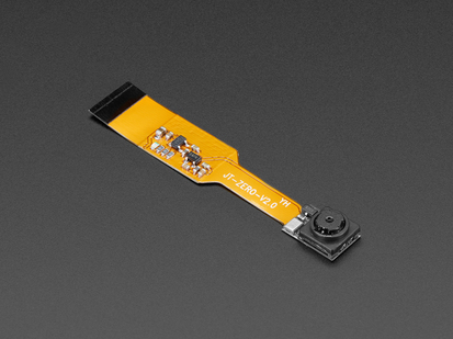 Angled shot of Zero Spy Camera for Raspberry Pi Zero connected to a ribbon cable.