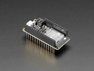 Angled shot of an Assembled Adafruit HUZZAH32 – ESP32 Feather Board - with Stacking Headers