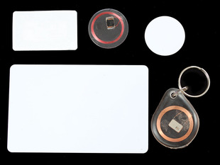 Assortment of discs, cards and stickers with RFID copper coils inside