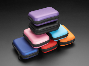 Many zipper cases in colors piled up