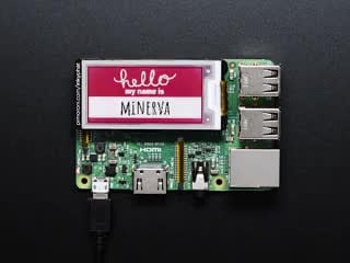 Pimoroni Inky pHAT connected to a Raspberry Pi, blinking in 3 Color eInk Display that reads "Hello My Name Is Blinka"