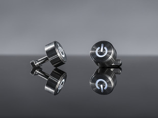 Metal cufflinks with light up image of a power button on them