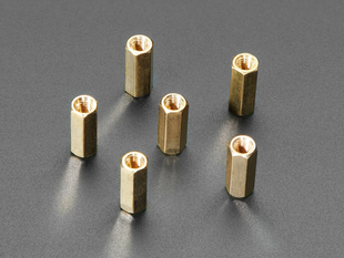 Angled shot of 6 stand offs from a Circuit Playground Bolt-On Kit.
