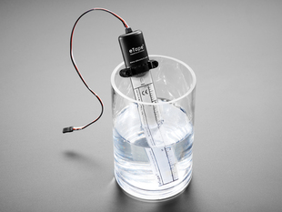  Liquid Level Sensor with Plastic Casing inserted into glass with water