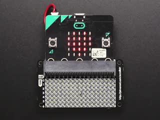 Video of a Pimoroni scroll:bit with a micro:bit inserted reads "Adafruit!" scrolling across the display. 