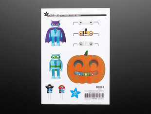 Sticker sheet displaying halloween themed cartoon stickers of a pumpkin, robot, capacitors and resisters.  
