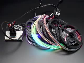 8 various colored LEDs powered by Adafruit NeoPXL8 Friend - 8 x Strands NeoPixel Level Shifter.