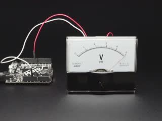 Video of an analog voltage panel meter. The needle sways back and forth.