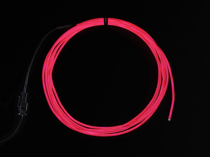 Coil of lit EL wire in pink