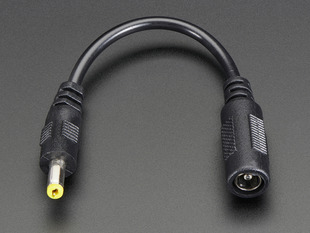 Close-up of a 2.1mm to 1.7mm DC jack adapter - Black.