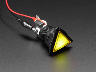 Angled shot of a yellow triangle illuminated LED pushbutton. 