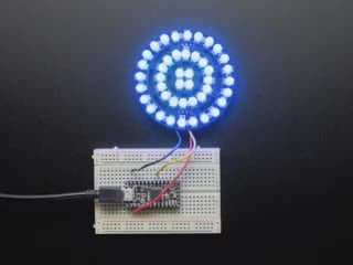 NeoPixel Triple-Ring Board with 44 Thru-Hole LEDs wired to Arduino, lighting up rainbow