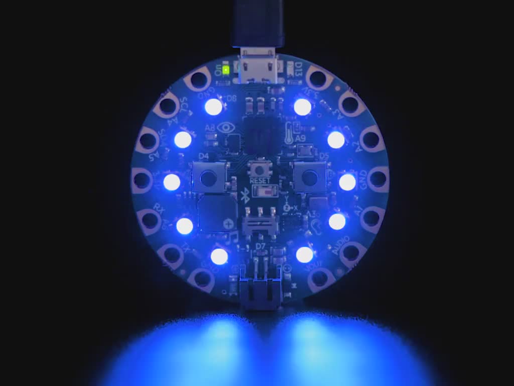 Circuit Playground Bluefruit pulsing blue LEDs.