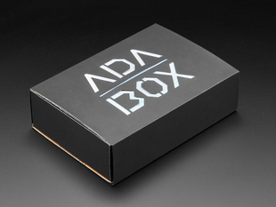 Angled shot of black box that reads "ADABOX".