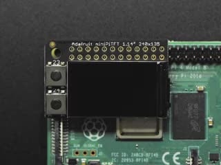 Video of Adafruit Mini PiTFT - 135x240 Color TFT Add-on assembled onto a Raspberry Pi 3. The TFT displays a bootup.