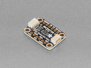 Angled shot of black, square-shaped DAC breakout board.