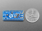 Back shot of Adafruit ItsyBitsy nRF52840 Express - Bluetooth LE next to US quarter for scale. 