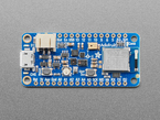 Overhead shot of blue, rectangular, microcontroller.