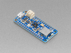 Angled shot of blue, rectangular, microcontroller.