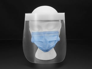 Head on shot of the face shield on a mannequin head. Shield starts at the forehead and ends below the chine