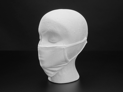 White cloth face mask shown on a mannequin