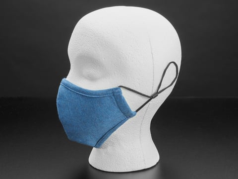 Blue cloth face mask shown on a mannequin