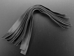 10 black elastic strips shown together