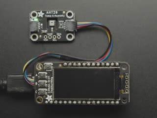 Video of a Adafruit FeatherWing OLED - 128x64 OLED Add-on For Feather - STEMMA QT / Qwiic connected to a temp and humidity sensor. Display reads "Adafruit" and various Temp and Humidity measures.  