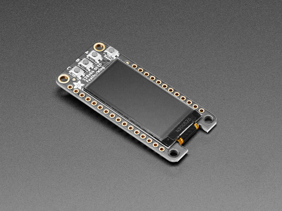 Angled shot of a Adafruit FeatherWing OLED - 128x64 OLED Add-on For Feather - STEMMA QT / Qwiic.