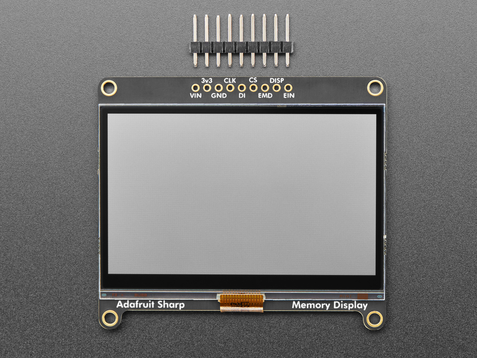 Top down view of a Adafruit SHARP Memory Display Breakout with a piece of 0.1" header.