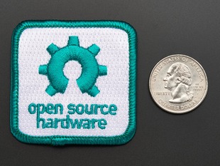 Square embroidered badge with partial gear logo and the words Open Source Hardware in turquoise, on white background with turquoise edging. 