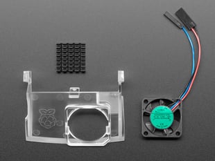 Kit contents showing plastic insert, fan, and heat sink