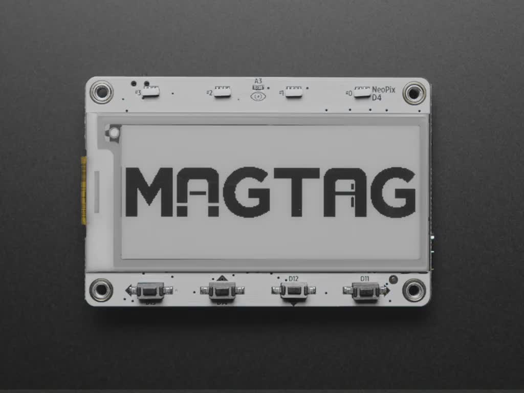 MagTag board updating the E-Ink display and the NeoPixels in rainbows.