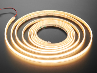Long Coiled LED strip lit up warm white