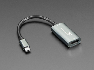 Angled shot of a HDMI to USB-C Video Capture Adapter.