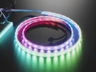 Video of powered-on NeoPixel strip 1 meter long running rainbow LED example code.