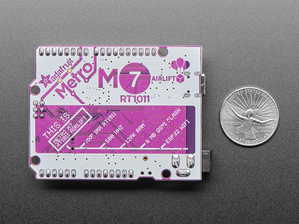 Back shot of Adafruit Metro M7 with AirLift - Featuring NXP iMX RT1011 measured by US quarter. 