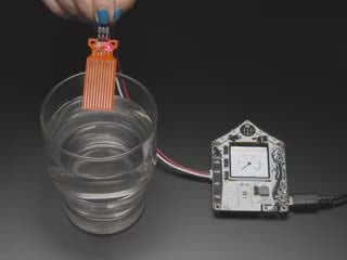 Video of someone dunking the water sensor into a glass of water. The TFT on the FunHouse displays a wetness gauge that goes from 0 to 100.