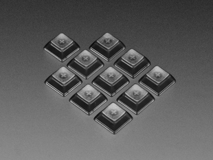 Grouped shot of 10 pack DSA color keycap Translucent Smoke KIT