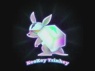 A video of the NeoKey Trinkey creature that is like an armadillo with a keycap on its back which emits rainbow colors.