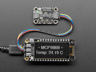 Top view of temperature sensor breakout above an OLED display FeatherWing. The OLED display reads "MCP9808 Temp: 24.19ºC"