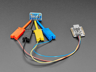 Angled shot of a QT Py microcontroller plugged into a JST-SH cable with four micro SMT test hooks in yellow, blue, red, and black. The test hooks grip the first four connections on a breakout board.