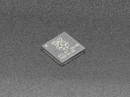 Angled shot of single RP2040 microchip.