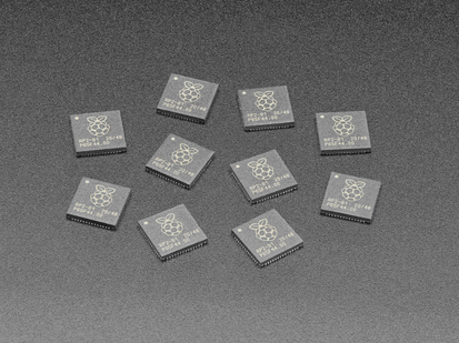Angled shot of 10 RP2040 microchips.